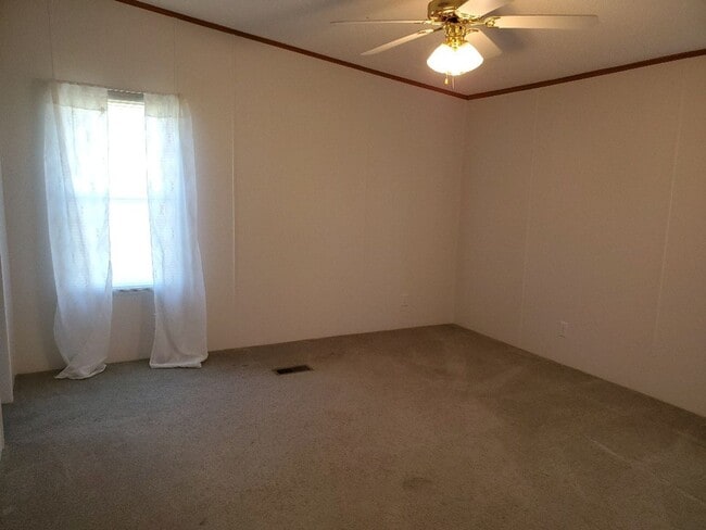 Building Photo - Charm & Commuter Convenience – 3BR/2BA Outside City Limits