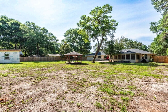 Building Photo - "Renovated 4-Bedroom in Rocky Bayou Estates!"