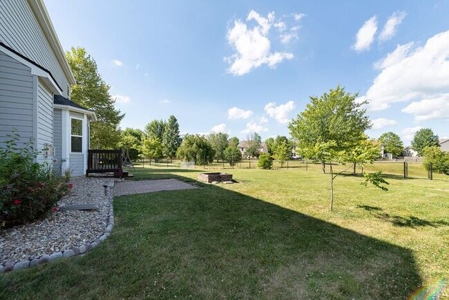 Building Photo - 4 Bedroom Home With Pond View in Top Rated...