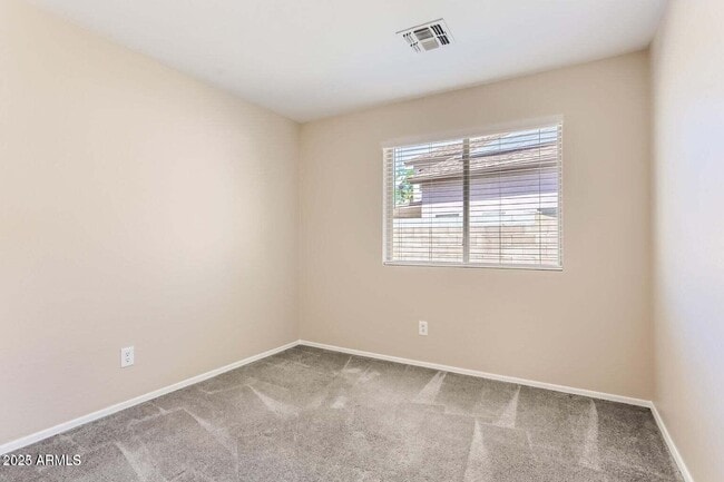 Building Photo - 6038 N Almanza Ln