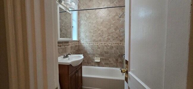 Building Photo - Short walk to Longwood! Steps to T! Large 1 bedroom w/Cute kitchen with eat-in alcove! (7/1)