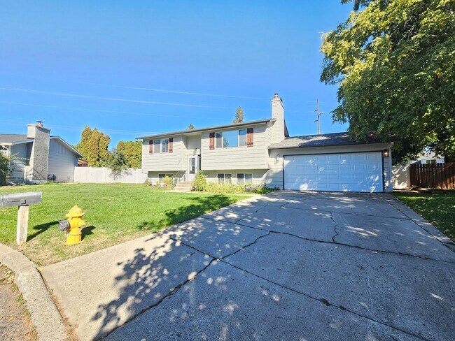 Building Photo - 1721 E 58th Ave