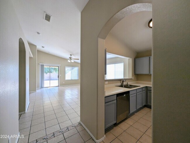 Building Photo - 7059 W Gardenia Ave