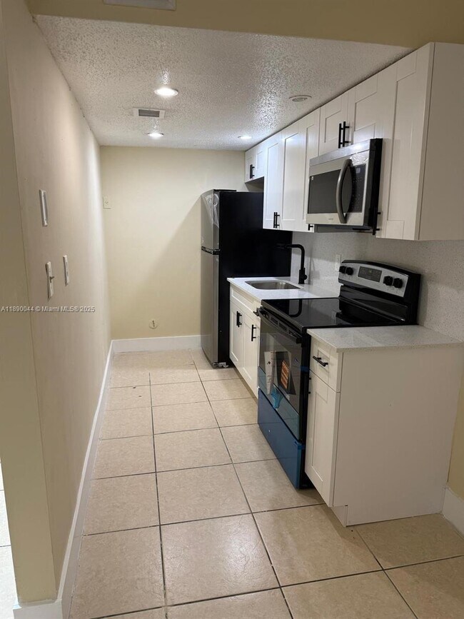 Building Photo - 2377 W 66th Pl