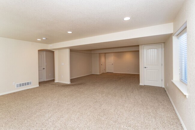 Building Photo - Spacious 5-Bedroom Home with Finished Base...