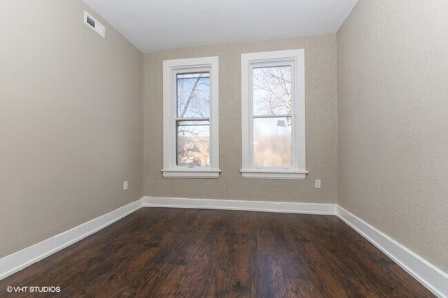 Building Photo - 11335 S Langley Ave