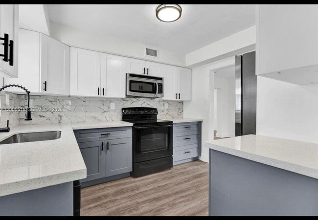 Building Photo - 427 NW 19th Ave