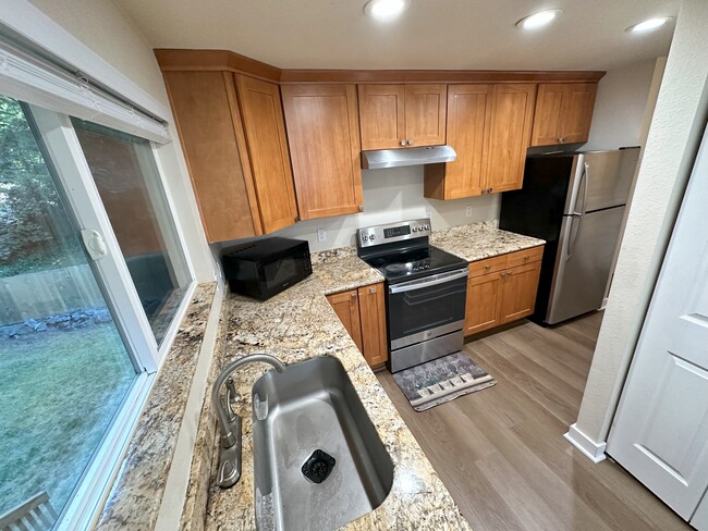 Spacious modern kitchen with lots of storage, modern cabinets including spice rack, "Lazy-Susan" rot - 17731 NE 88th Pl