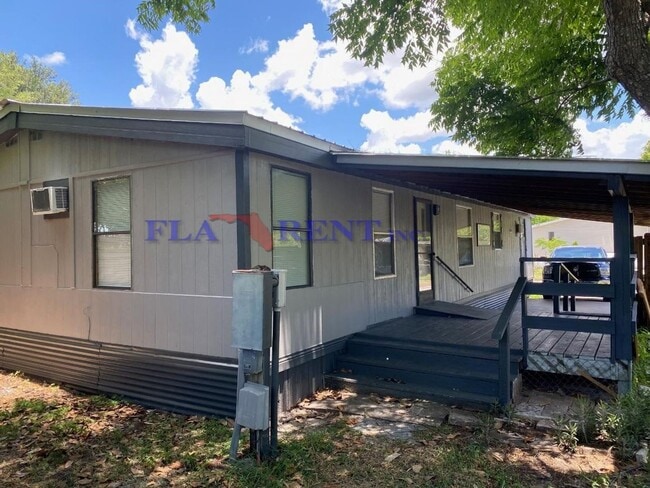 Building Photo - 3/2 Mobile Home with fenced yard DO NOT AP...
