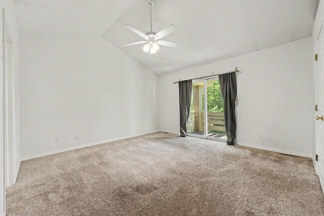 Building Photo - Beautiful 2BR Townhome in Gated Community with 2-Car Garage