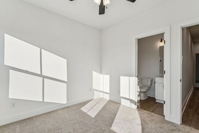 Building Photo - High-End 2BR Townhome | Rooftop Terrace + 2-Car Garage | 24-Unit Community