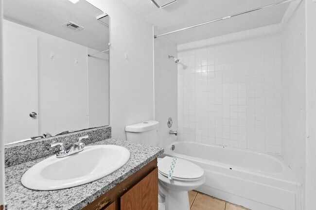 Building Photo - Spacious 2-Bedroom Condo with Fireplace – ...