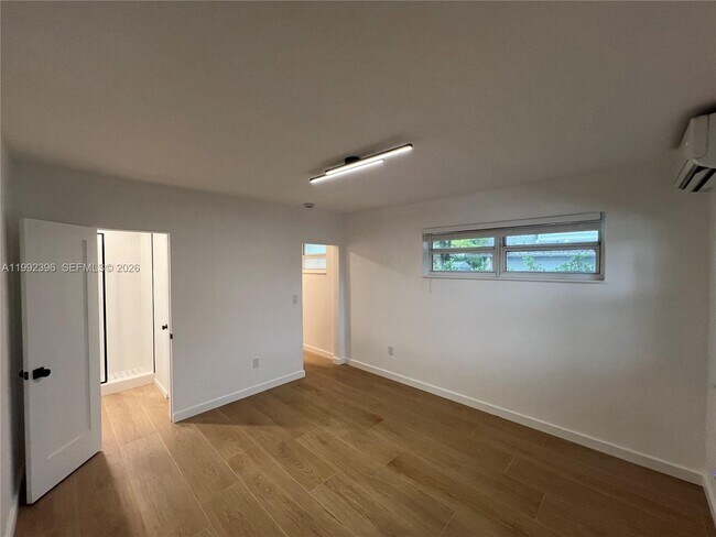 Building Photo - 7035 NE 4th Ct