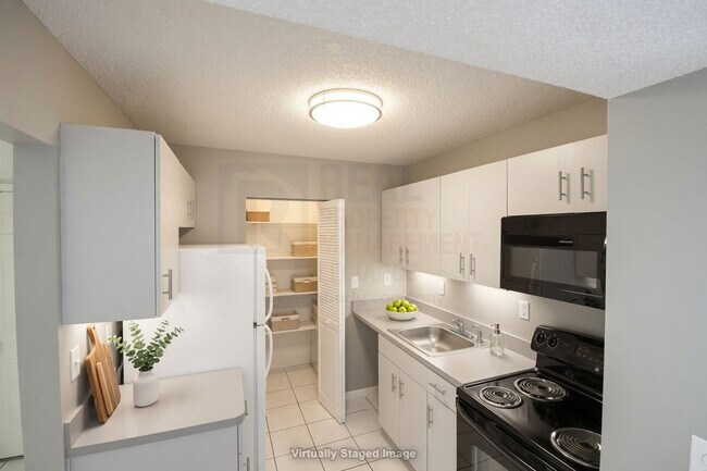 Building Photo - Prime Rental: Spacious 2-Bed, 2-Bath In Carmel Lakes Gated Community