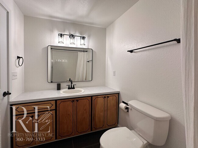 Building Photo - A Warm & Welcoming Rambler in the Heart of Central Kitsap