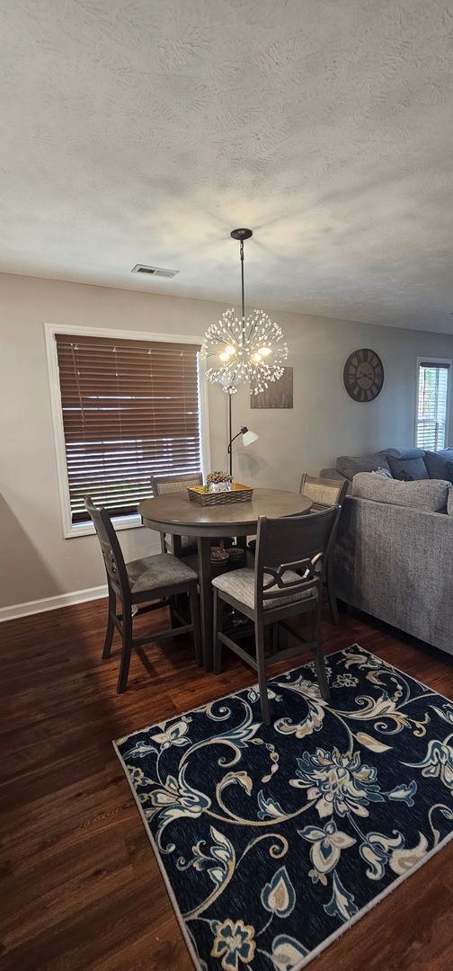 Building Photo - -First-Floor End-Unit | Fully Furnished 2B...