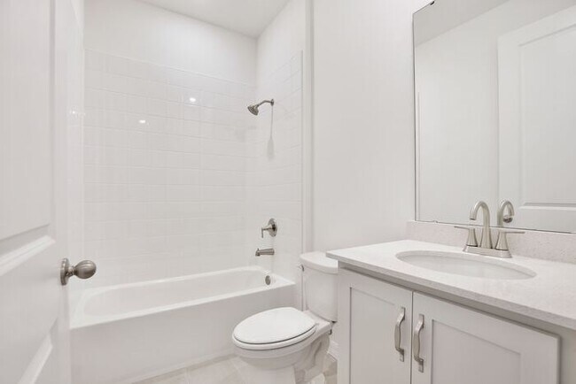 Building Photo - Stylish Sunbrooke Sanctuary! Modern 4/2 Ho...