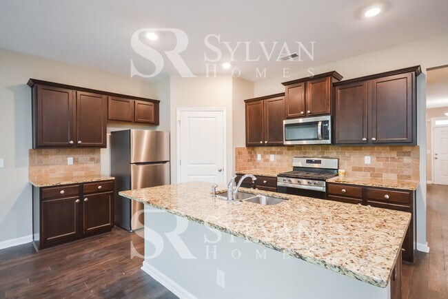 Building Photo - Don't miss out on this lovely 4BR 2BA home