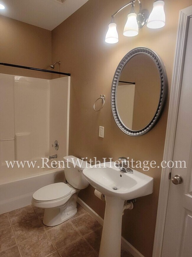 Building Photo - Gorgeous 3-Story Brick Home / 2 Fireplaces / Full Finished Basement / Chapel Hill Schools