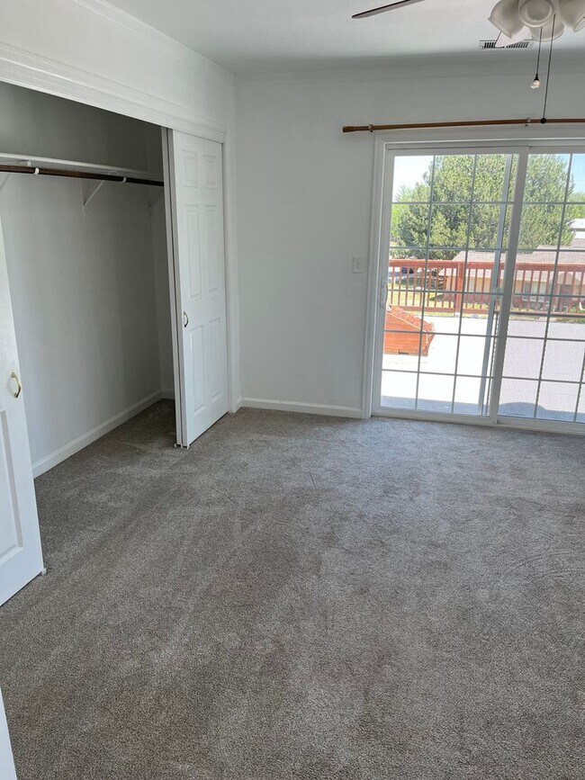 Building Photo - 4 Bedroom Gardener's Delight With Rooftop Patio, Privacy and Covered Parking