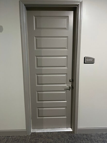 Door to Condo 1 - 4000 Shadow Green Dr