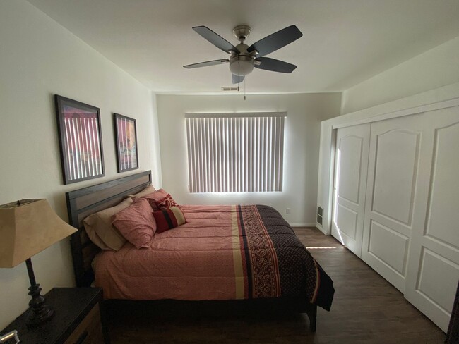 Building Photo - Cute and Charming furnished Condo with att...