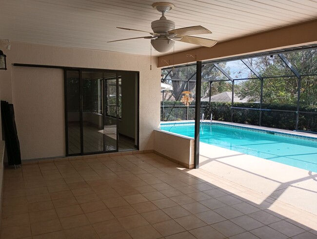 Building Photo - 3 bedroom 2 bathroom 1948 Sq ft Pool Home ...