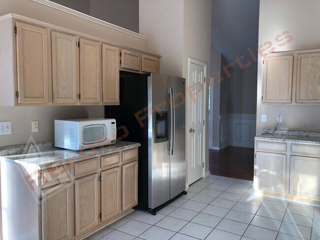 Building Photo - Elegant 4 Bedroom 2.5 Bath House w/ Primary Suite on 1st Floor + a Fenced-in Backyard @ Park Vill...