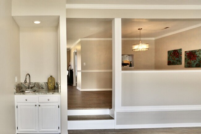 Building Photo - Updated End-Unit Brick Townhome Ready NOW!...