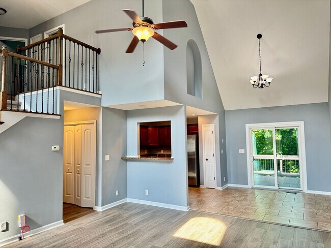 Building Photo - Large Open 4 Bedroom Home with Bonus! Tree Lined Backyard with Privacy Fence!