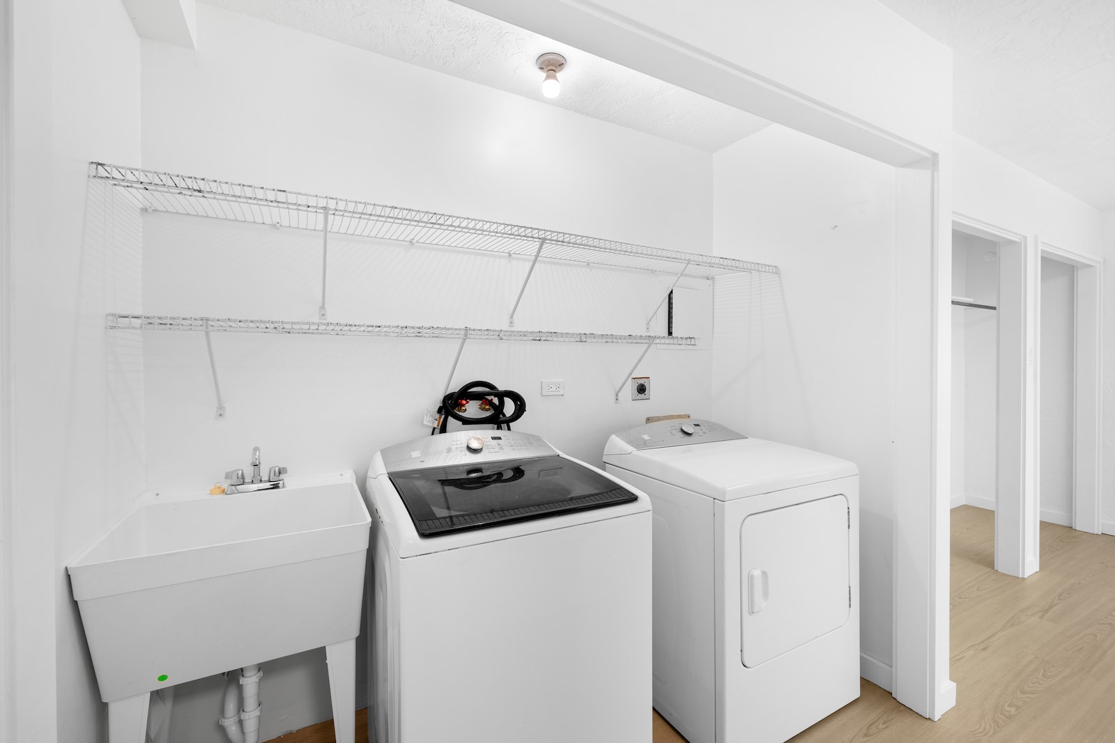 Washer, dryer, and wash tub located in an additional unit attached to the carport. - 45-162 Neepapa Pl