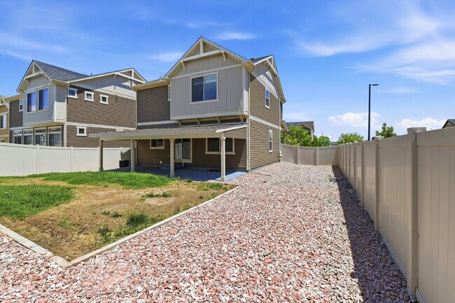 Building Photo - $2,940.95 - 4 Bed, 3 Bath Home in Denver with Central A/C and Fenced in Yard!