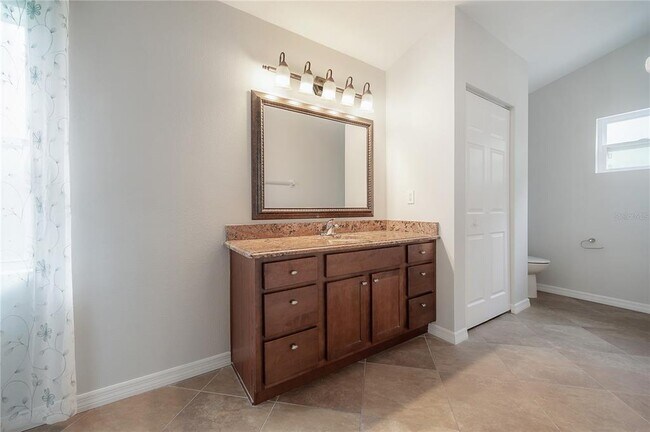 Building Photo - 10248 Woodford Bridge St