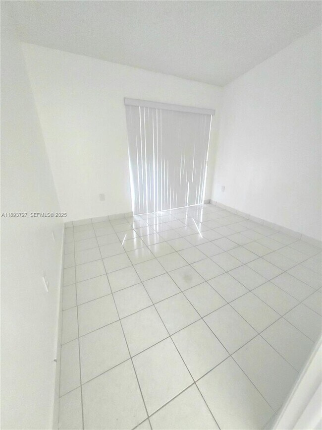 Building Photo - 18875 NW 62nd Ave