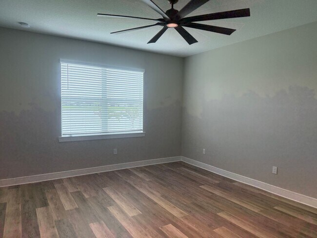 Building Photo - Lakeview Living with Bonus Flex Space & Resort-Style Amenities