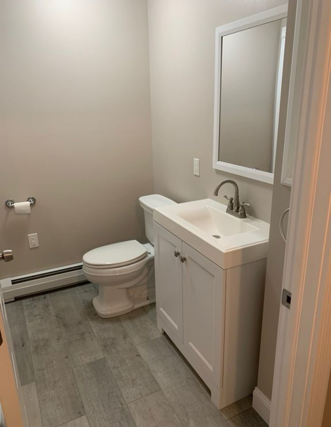 Second floor 1/2 bath at top of staircase. - 1744 Farmington Ave