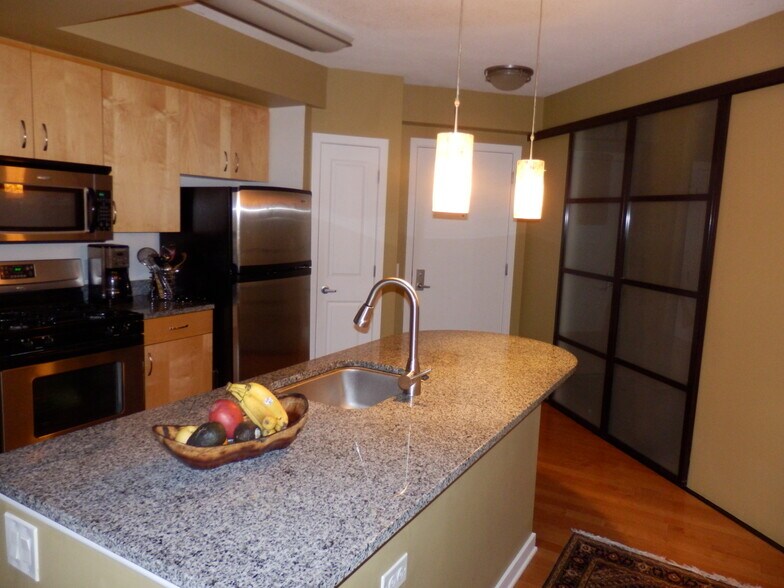 Gourmet kitchen with extensive counter space. - 475 K Street Northwest