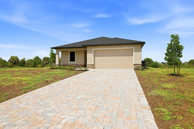 Building Photo - New 3/2 Pool Home for Rent on Canal, Fenced Yard, Pets Welcome. Your Dog Approves of This Backyard