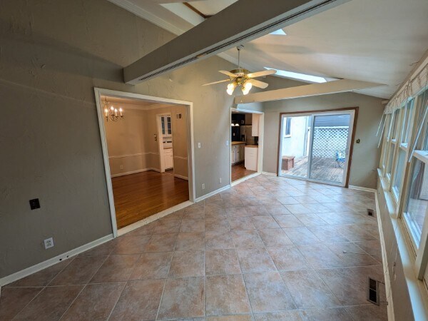 Sunroom opens to Dining Room, Kitchen and Deck. - 4515 West 72nd Terrace
