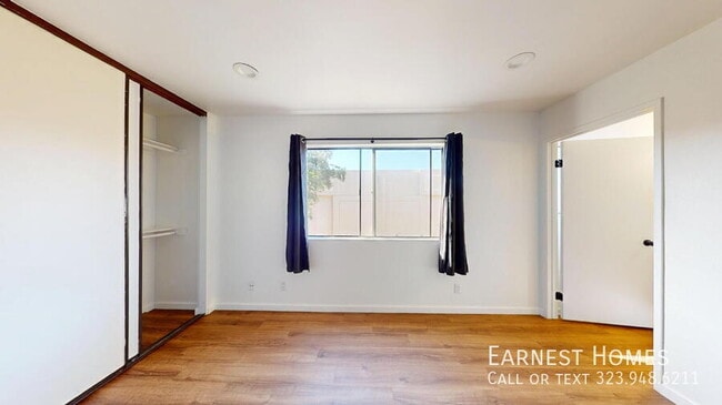 Building Photo - 10220 De Soto Ave