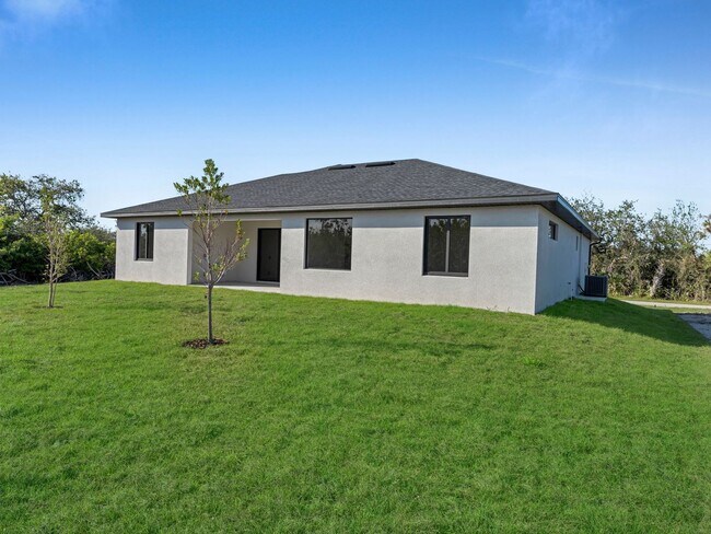 Building Photo - Brand-New Home for Rent – Port Charlotte, FL 33981. Qualify for a deposit-free option and save on...