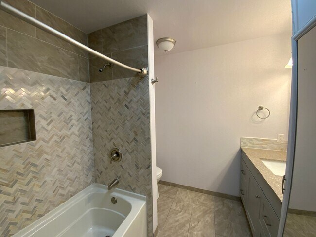 Building Photo - 4 Bedroom Single Story Home Available Near Tramway Blvd NE & Copper Ave NE!