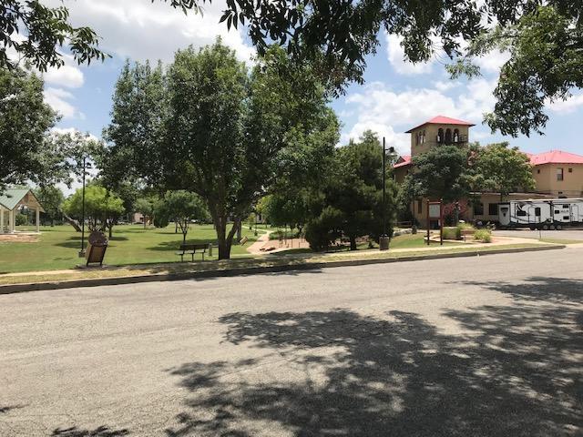 Park across the street - 208 E Twohig Ave
