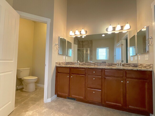 Building Photo - 4 Bedroom Home Available Near Woodmoor Dr ...