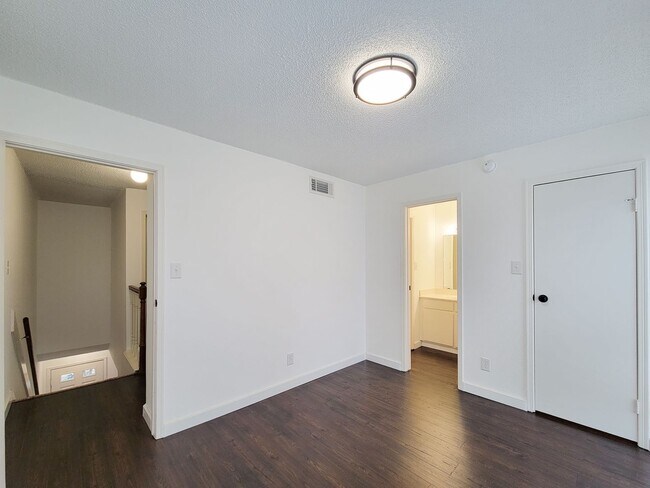 Building Photo - Beautiful two-story corner unit filled with natural light!
