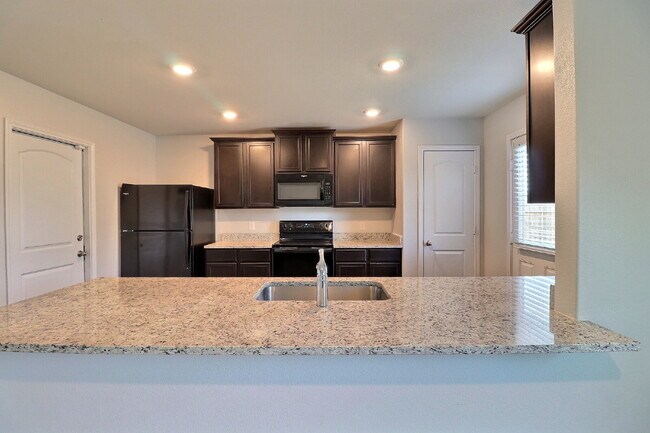Building Photo - Move-In Ready 3-Bed Home with Solar Panels + Washer, Dryer & Refrigerator — Half Off Second Full ...