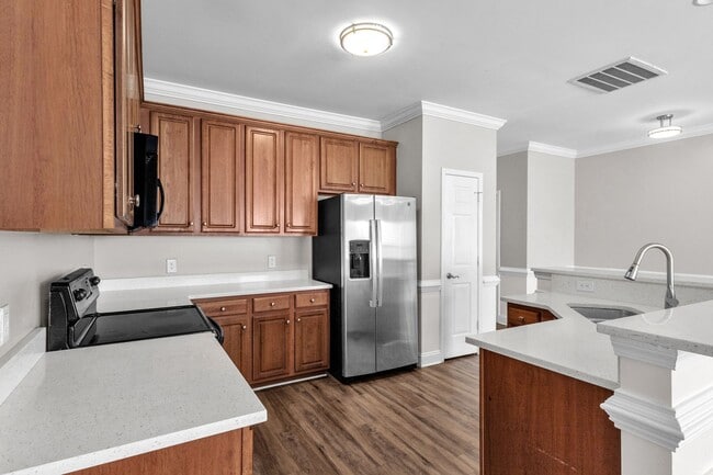 Building Photo - Spacious 3 bedroom 2.5 bath Townhome with 1 car garage - Close to Nexon/Carnes