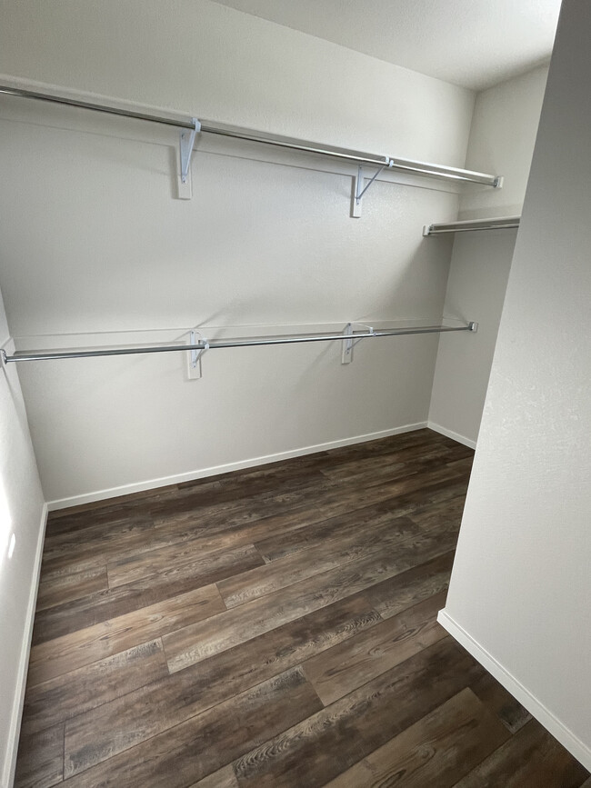 Huge primary bedroom walk-in closet - 1800 Iron Wheel Dr