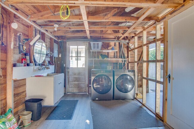 Building Photo - 3-Bedroom, 1-Bathroom Cottage in East Hill with Solar Power & Wraparound Deck!