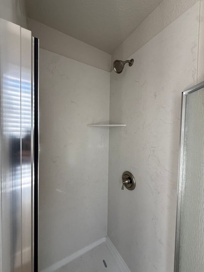 Building Photo - 3 Bed| 2 Bath | 1153 SF | Private Driveway | Single Story | Tenant pays $175 monthly for WS&G